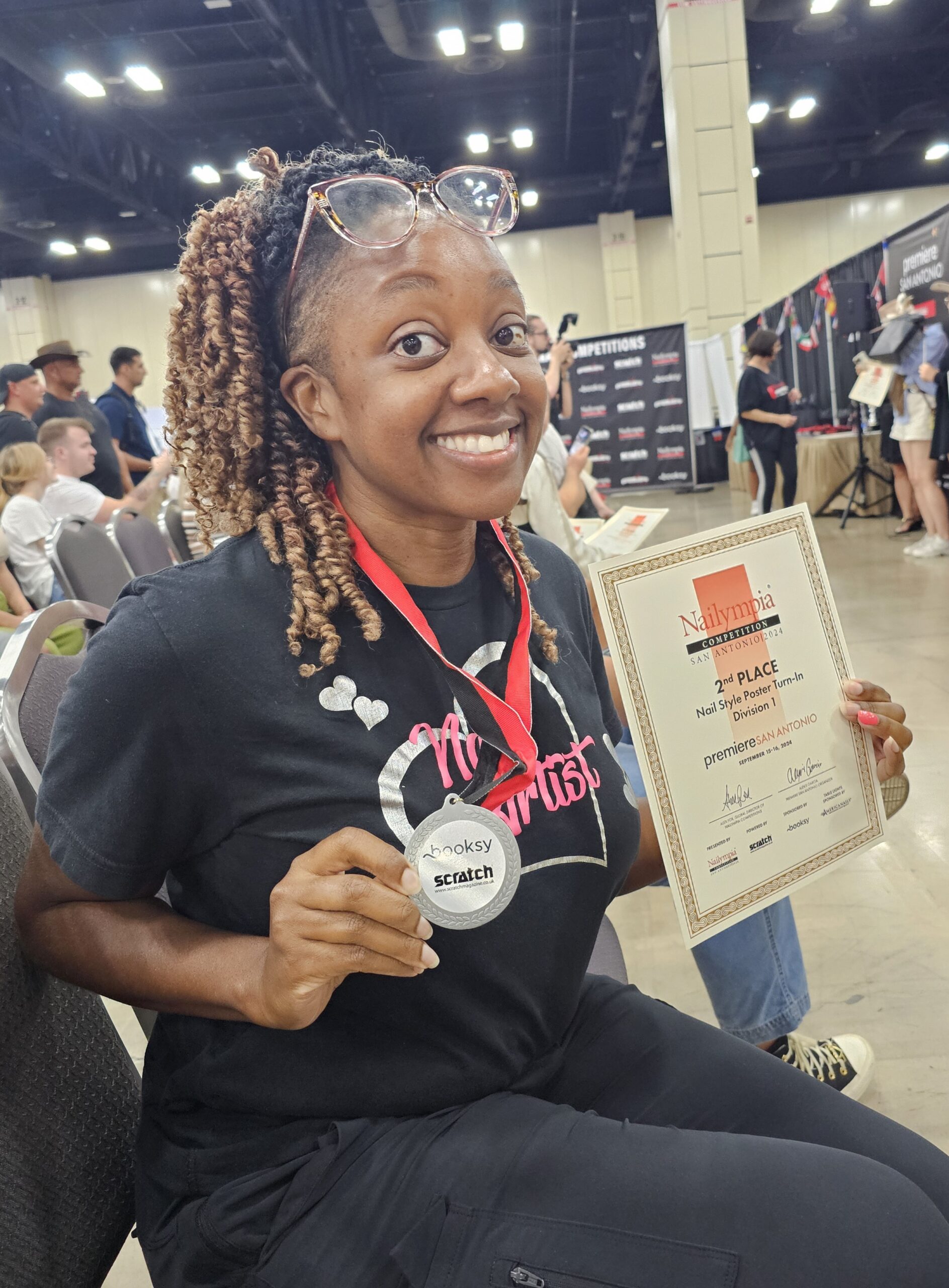Chloe of Glam Nailz by Chloe celebrating her second Nailympia Championship win, San Antonio nail artist